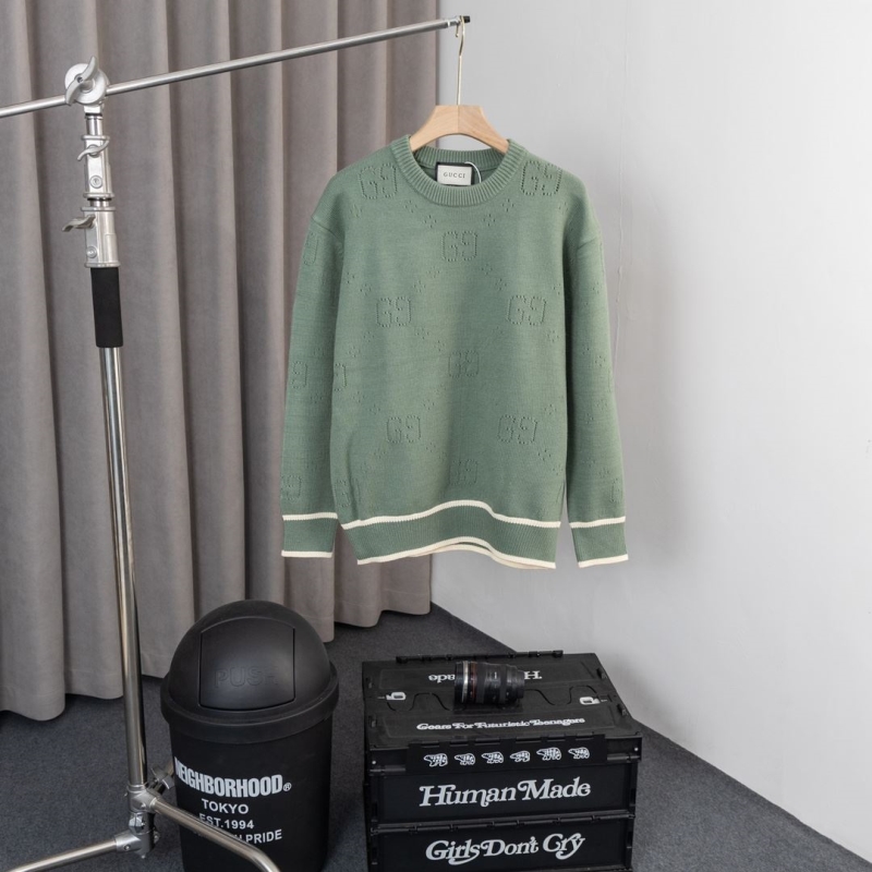 G*u*i sweaters